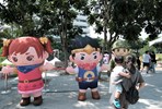 二大主角「阿山」、「秋妹」氣偶及國軍娃娃遊行。